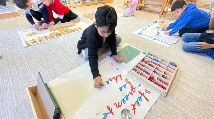 Montessori Student learning reading and spelling